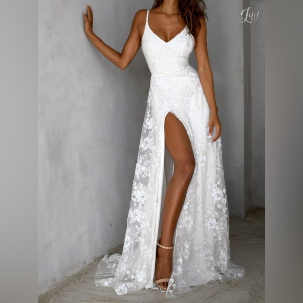Wedding gown with lace overlay, spaghetti straps, elegant, split maxi dress.